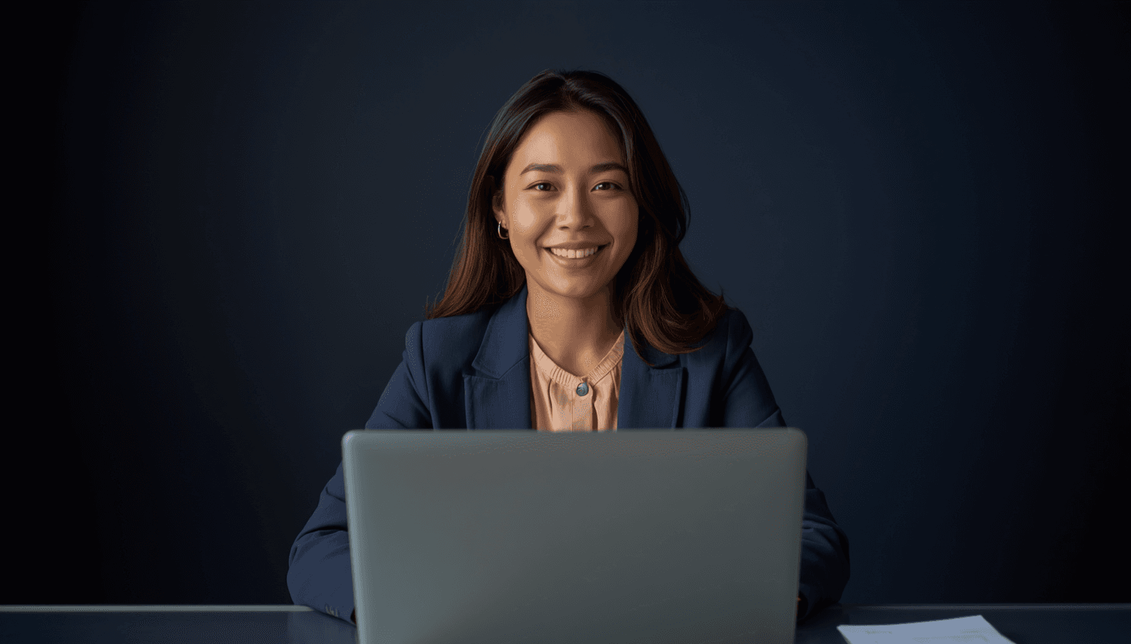 Young Filipino female agriculture graduate in navy blazer at laptop for ALE application guide Philippines 2026