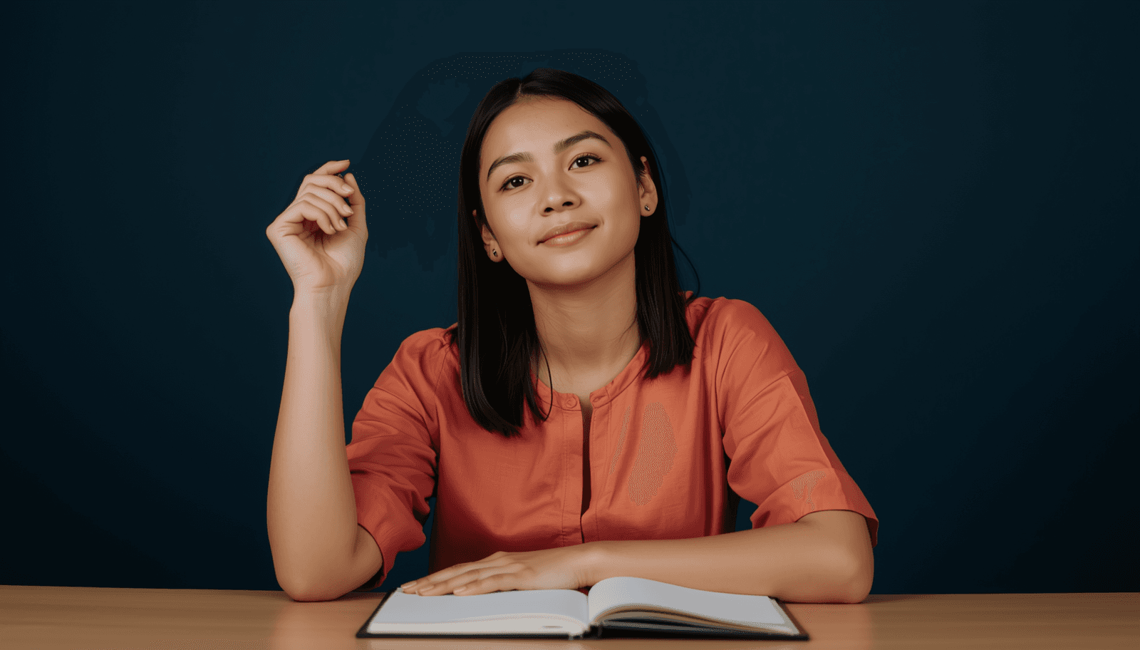 Young Filipino female student in orange blouse with notebook for PRC board exam tips that actually work Philippines 2026
